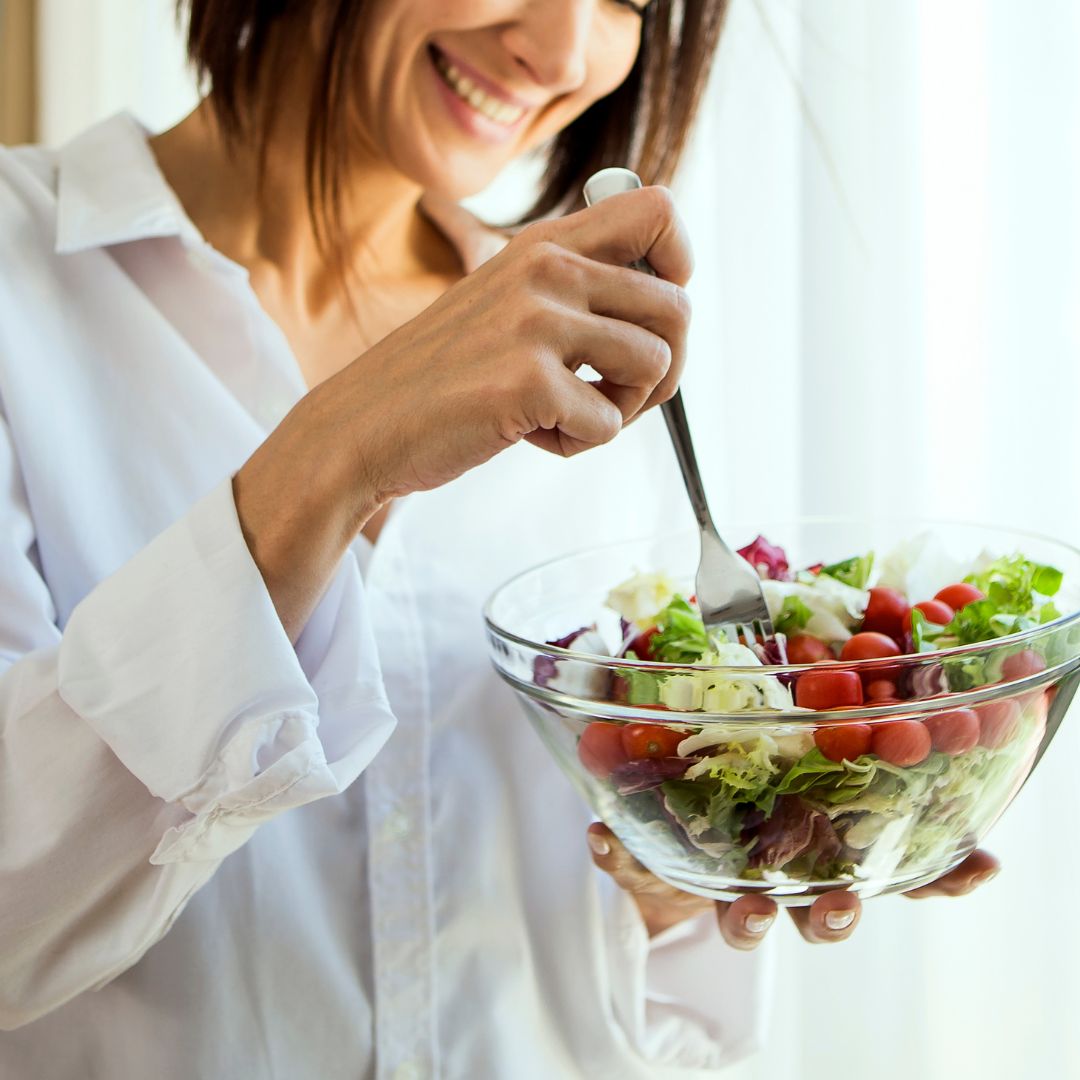 older lady eating salad