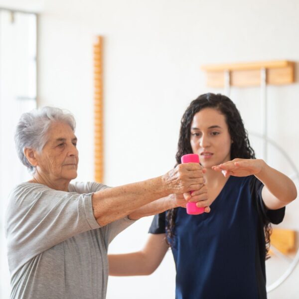 physical therapist working with patient