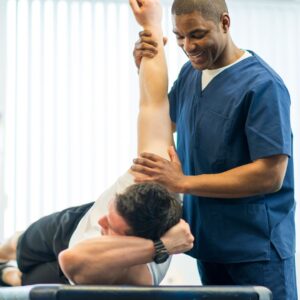 physical therapist performing manual therapy
