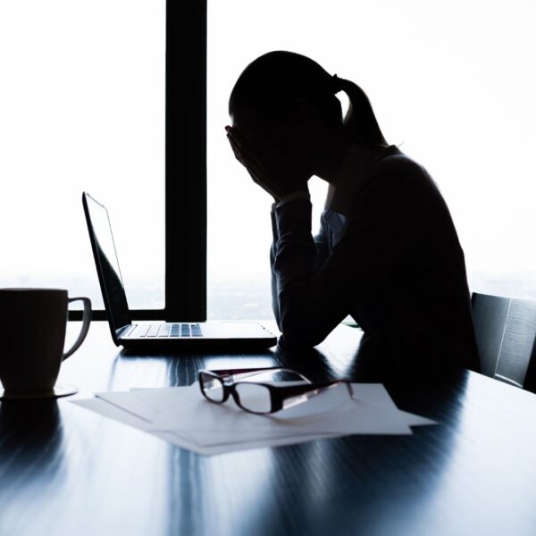 woman stressed at computer