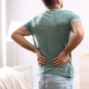 man experiencing back pain