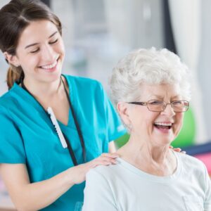 older woman seeing chiropractor