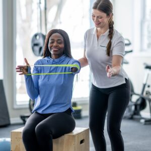 woman seeing physical therapist