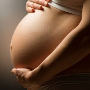 Pregnant belly.
